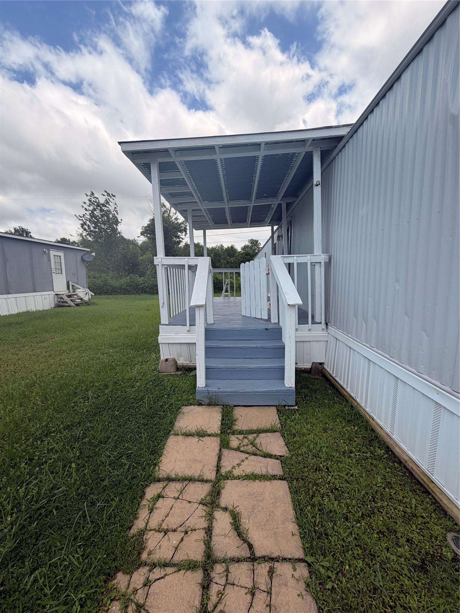 2021 North Battlebell Road, Unit 40 Highlands, TX 77562 - Photo 19 of 19 a view of a backyard with wooden fence