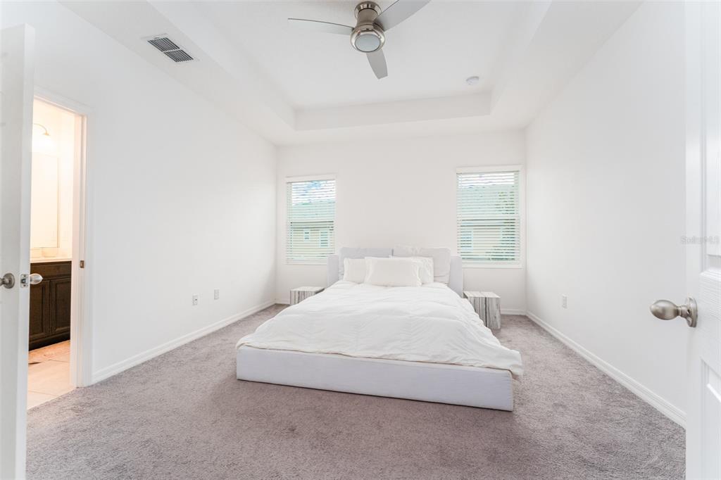 14072 Kite Lane Lithia, FL 33547 - Photo 16 of 25 a bedroom with a bed and a window
