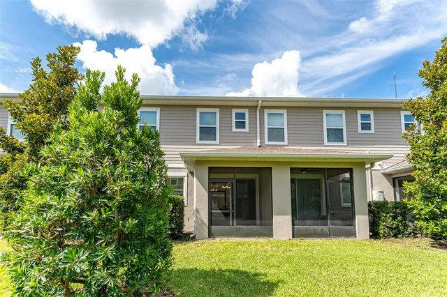 an aerial view of a house with outdoor space