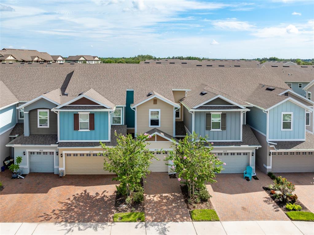 14072 Kite Lane Lithia, FL 33547 - Photo 3 of 25 a view of a house with a yard and a table