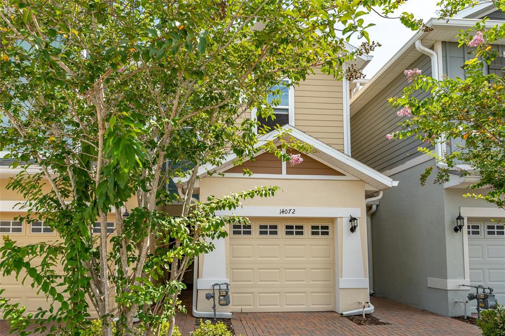 14072 Kite Lane Lithia, FL 33547 - Photo 4 of 25 a front view of a house with a garage