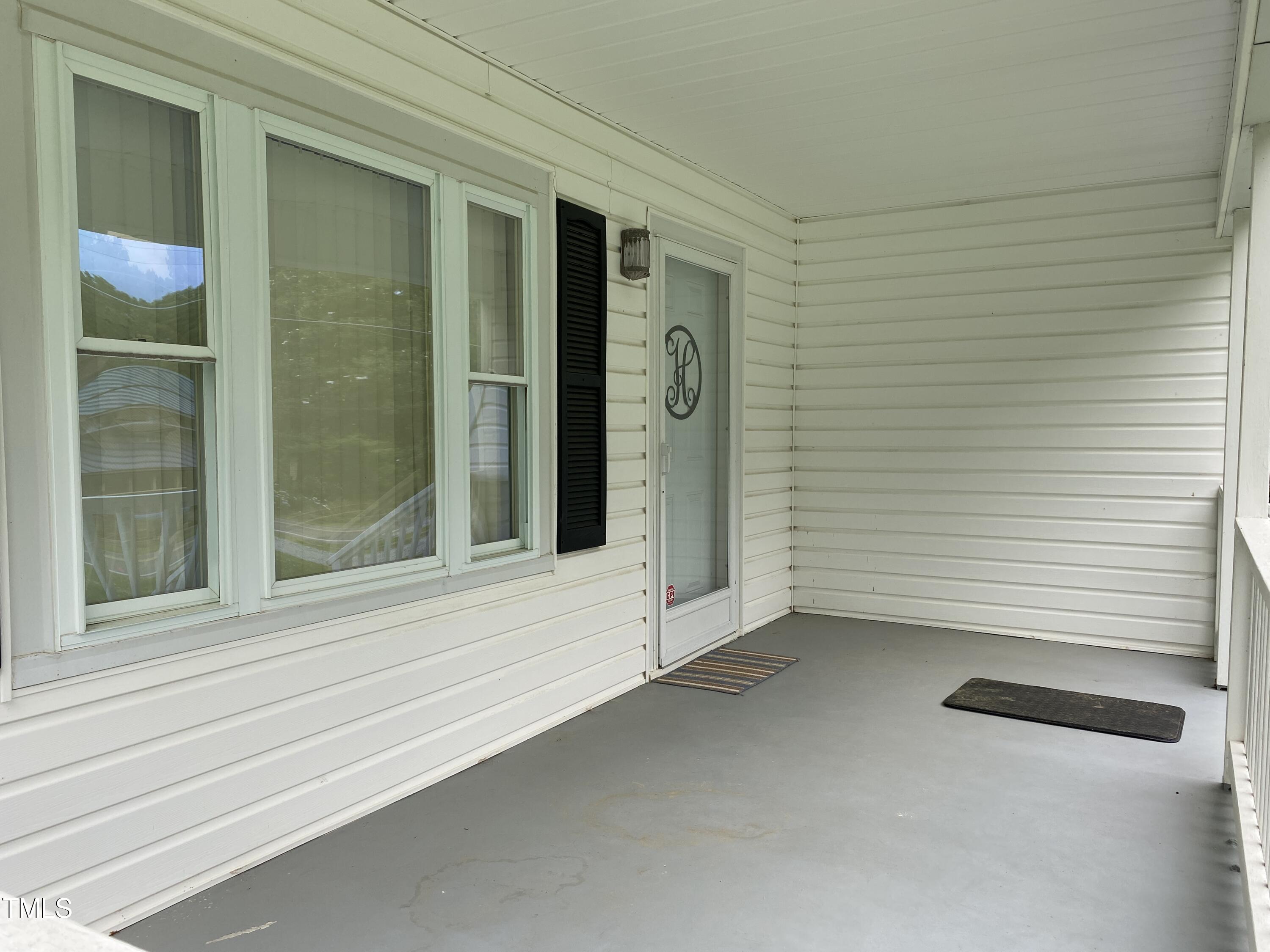 1711 Bahama Road Bahama, NC 27503 - Photo 2 of 20 Front covered porch