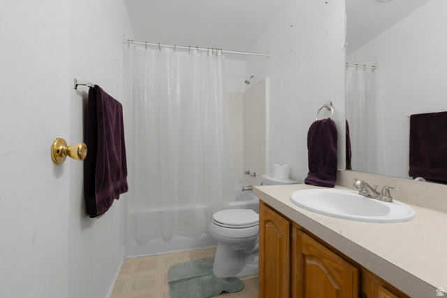 2600 North Hill Field Road, Unit 134 Layton, UT 84041 - Photo 28 of 41 Bathroom featuring vanity, shower / bath combo, and light floors