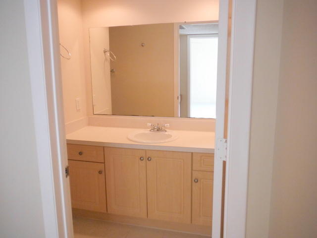 825 Center Street, Unit 56D Jupiter, FL 33458 - Photo 9 of 19 Guest Bath Vanity