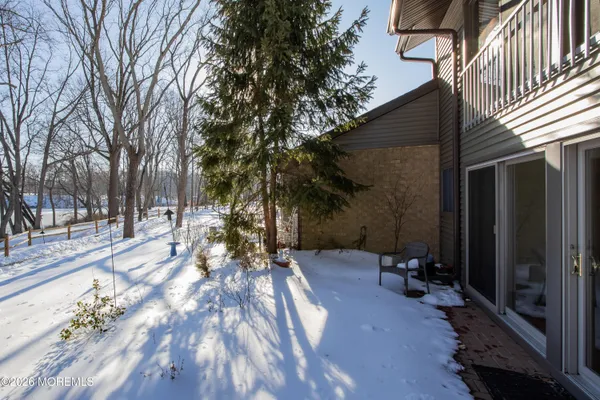 a view of a backyard of the house
