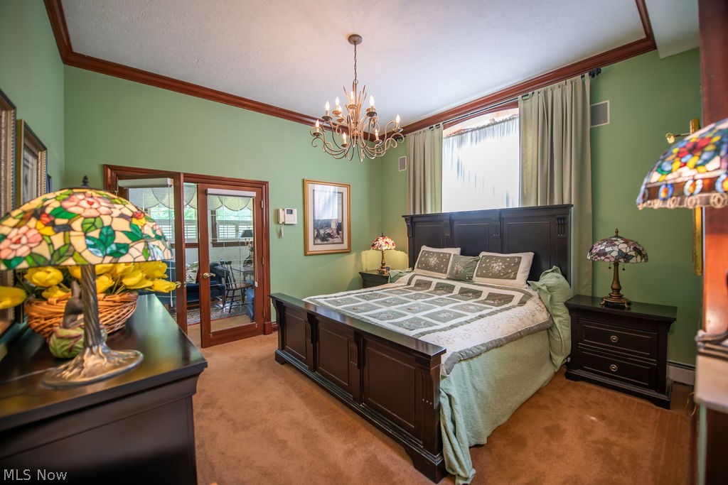2009 Lakewood Road Southwest Sherrodsville, OH 44675 - Photo 25 of 47 Spacious and inviting primary bedroom highlighting the abundant natural light