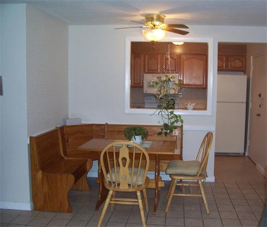 A3 Colonial Drive, Unit 2 Andover, MA 01810 - Photo 4 of 11 a view of a dining room with furniture and chandelier