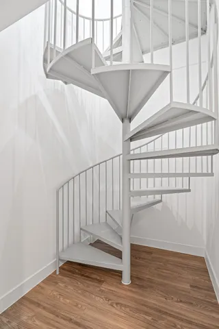 a view of entryway with wooden floor