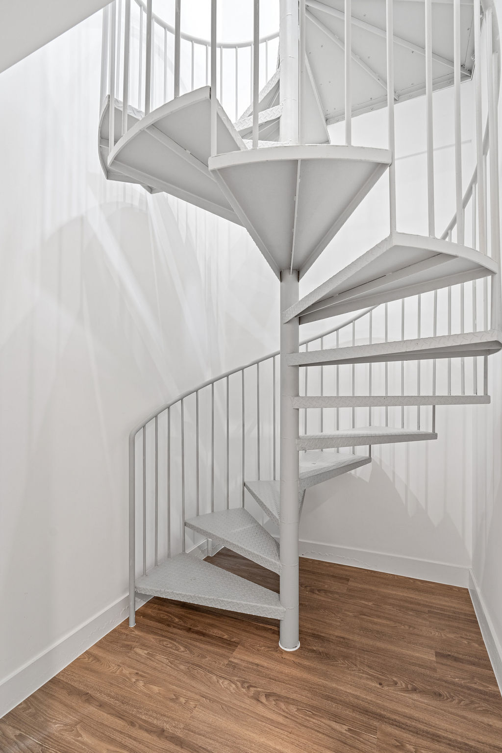 Undisclosed Address Queens, NY 11101 - Photo 11 of 21 a view of entryway with wooden floor