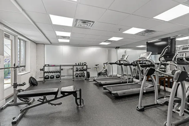 a view of a room with gym equipment