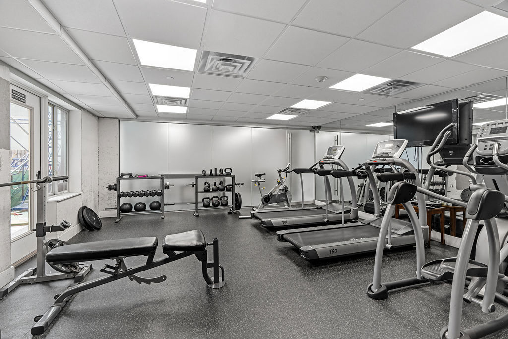 Undisclosed Address Queens, NY 11101 - Photo 19 of 21 a view of a room with gym equipment