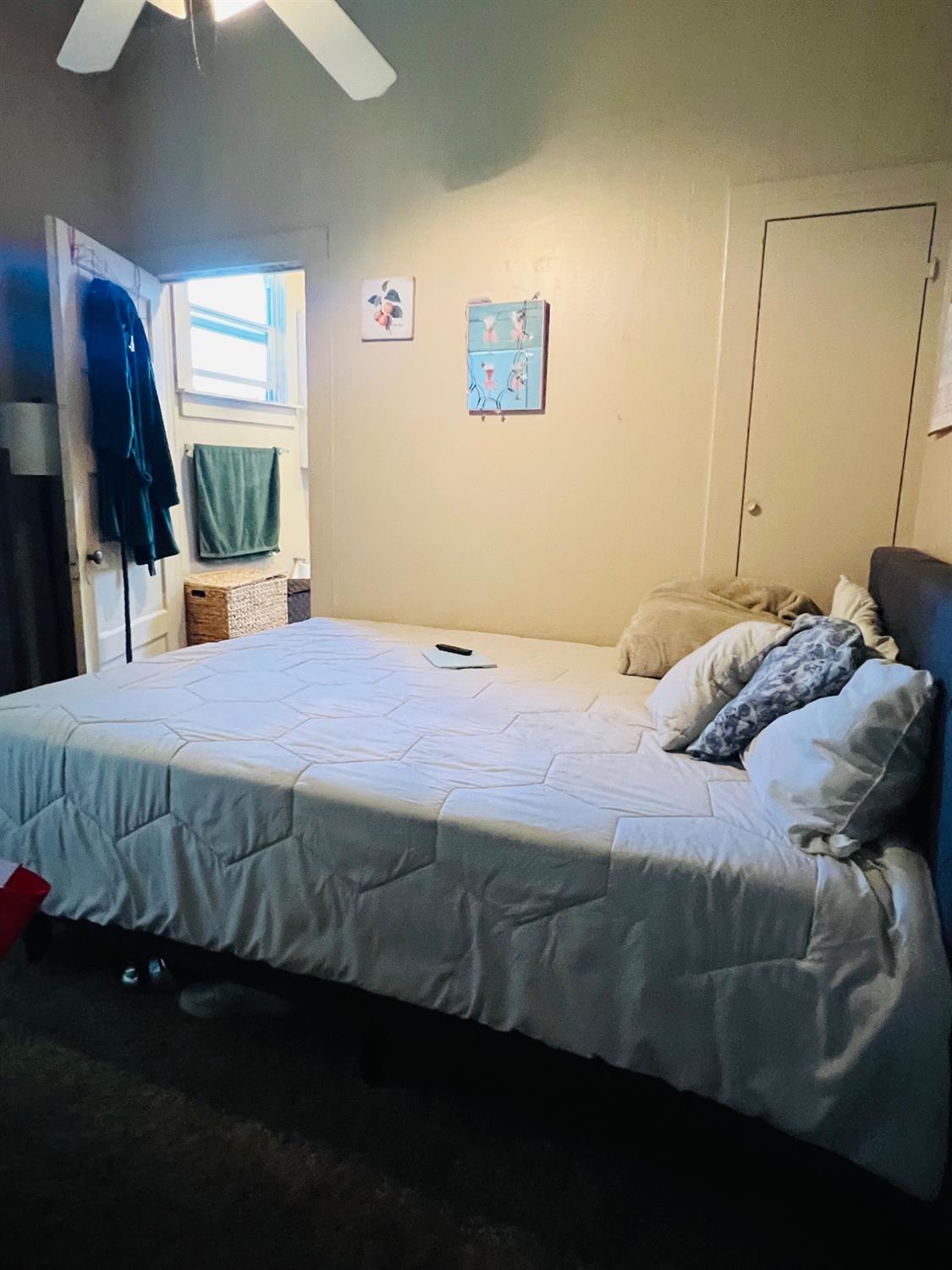 612 16th Street Modesto, CA 95354 - Photo 5 of 19 Front house bedroom with access to bathroom from the bedroom.