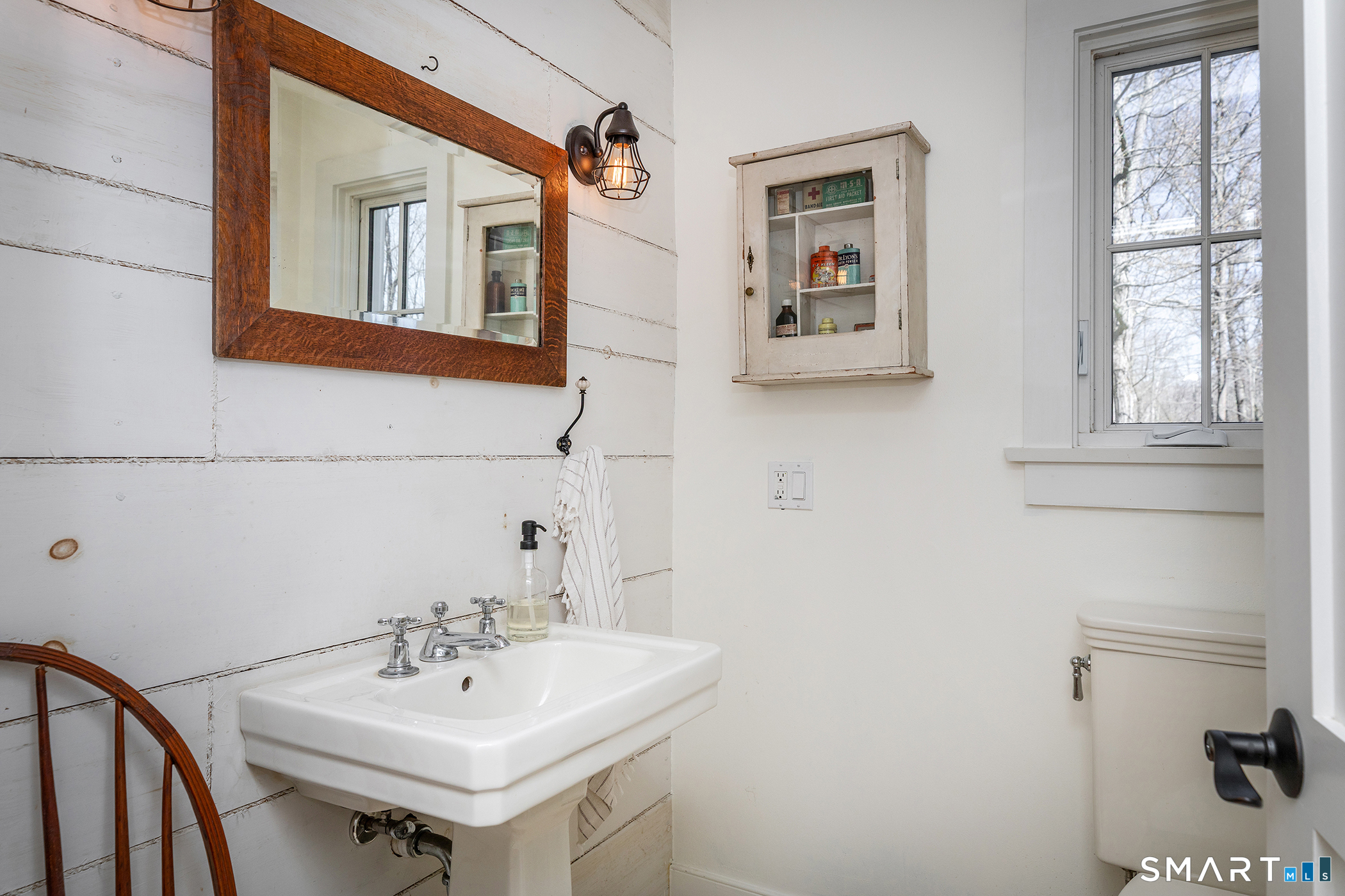 9 Old Paddock Lane Kent, CT 06785 - Photo 13 of 28 a bathroom with a sink and a mirror