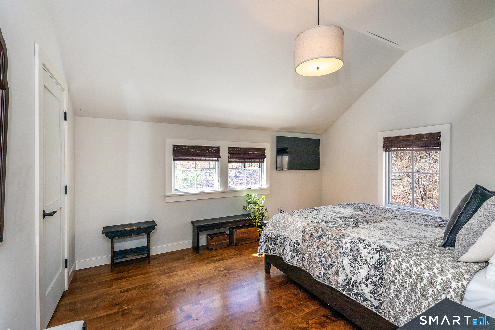 9 Old Paddock Lane Kent, CT 06785 - Photo 16 of 28 a bedroom with a bed and a flat screen tv