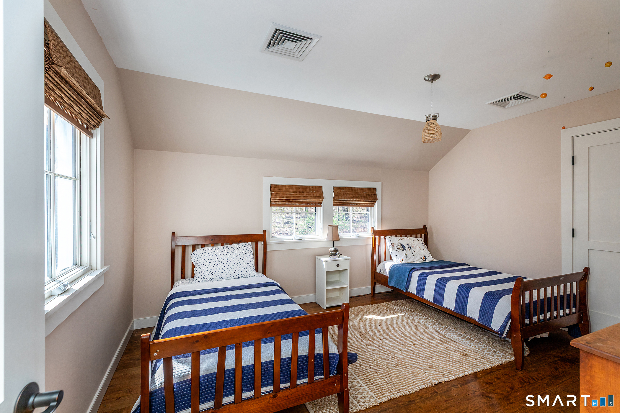 9 Old Paddock Lane Kent, CT 06785 - Photo 17 of 28 a bedroom with bed and wooden floor