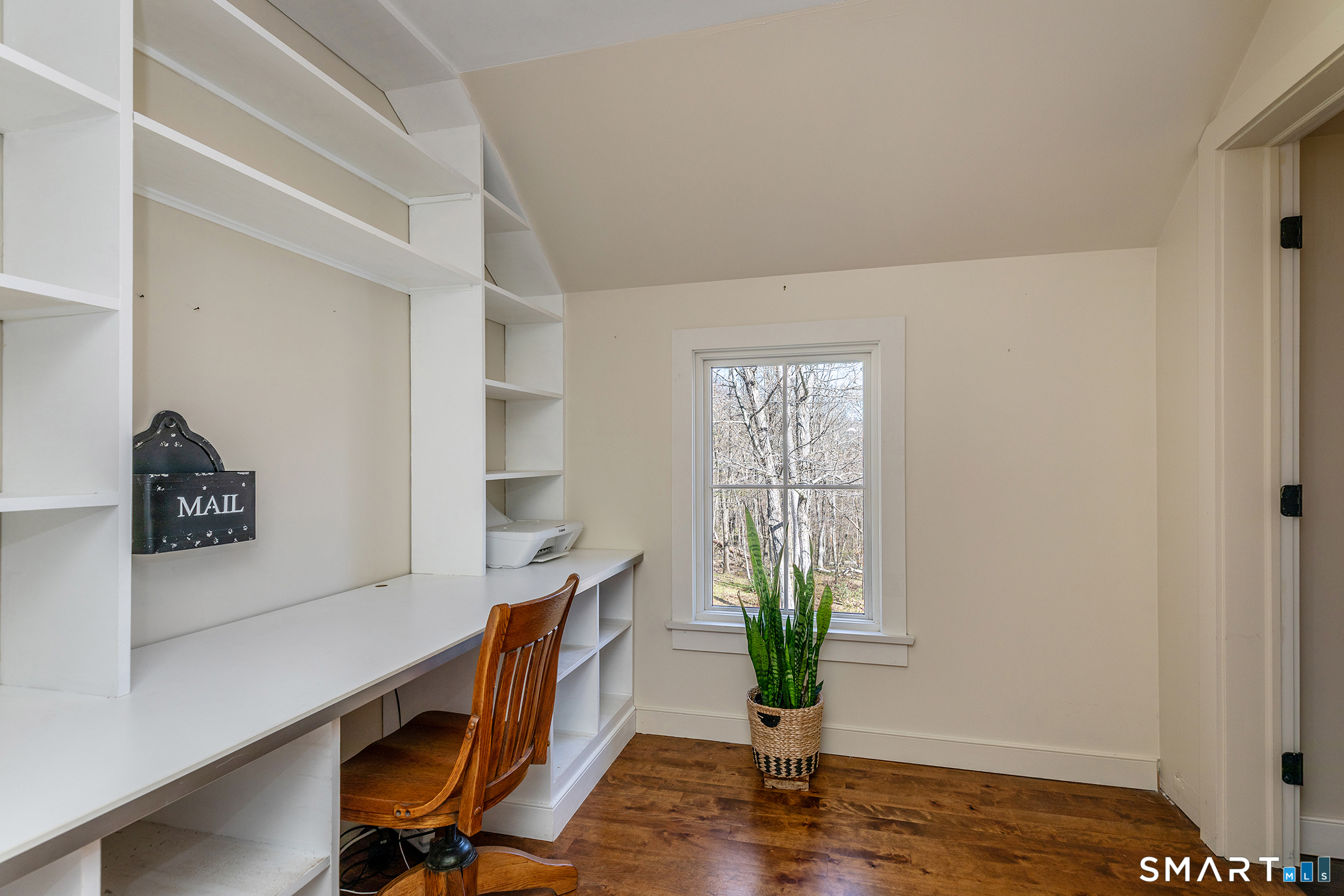 9 Old Paddock Lane Kent, CT 06785 - Photo 19 of 28 a workspace with furniture and wooden floor