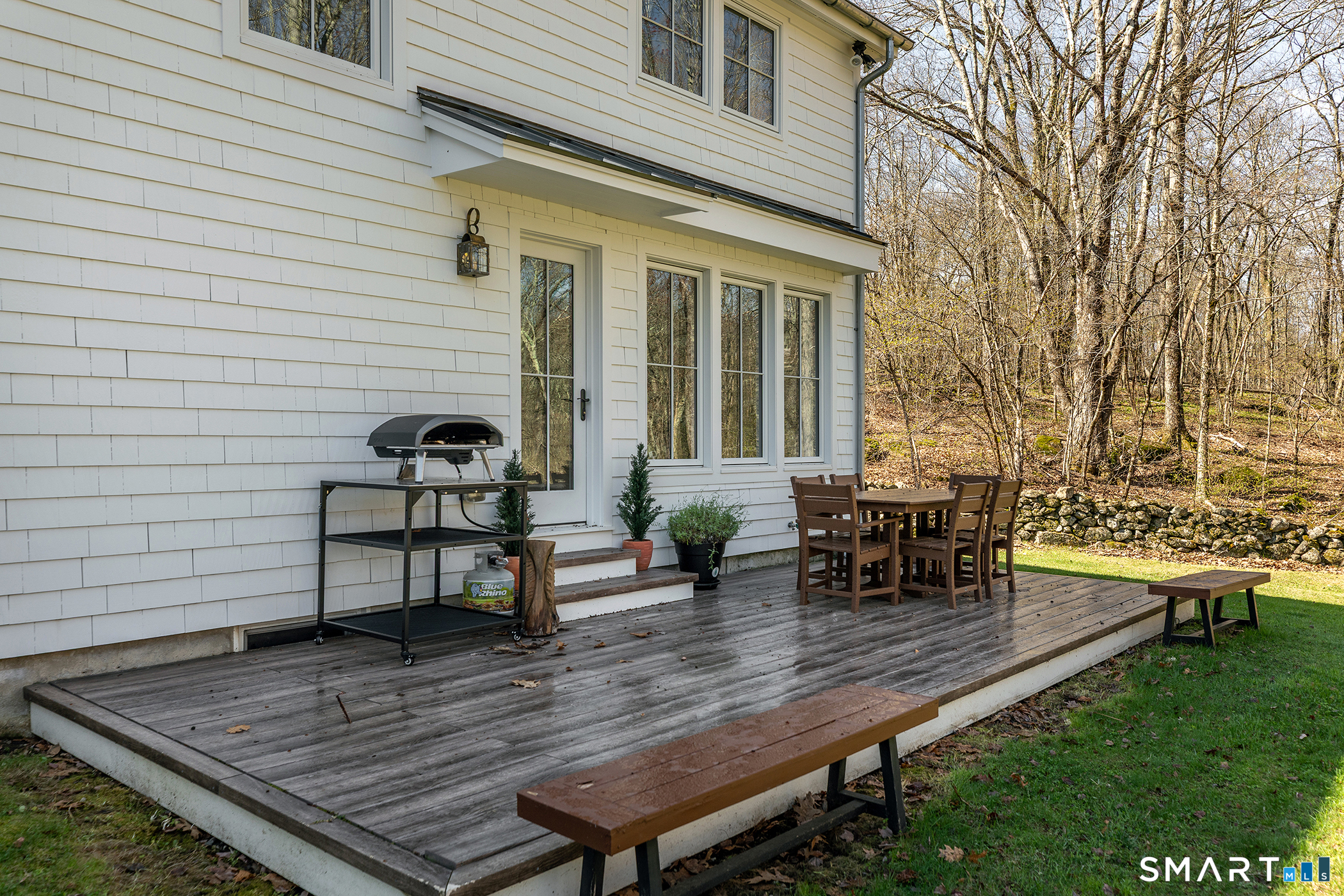9 Old Paddock Lane Kent, CT 06785 - Photo 10 of 28 a view of a wooden chairs and table on the wooden deck