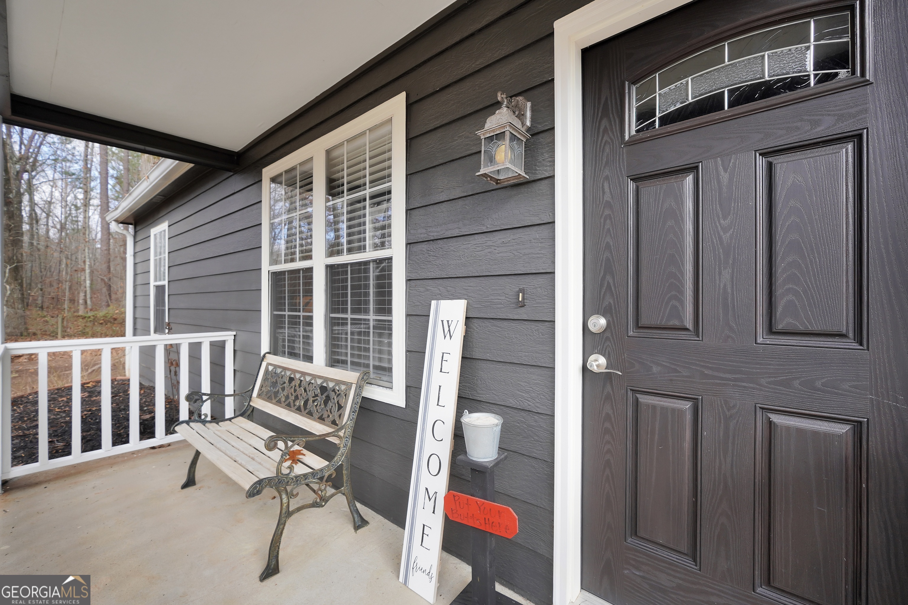145 Old Highway 85 Senoia, GA 30276 - Photo 2 of 40 a view of two chairs in the balcony