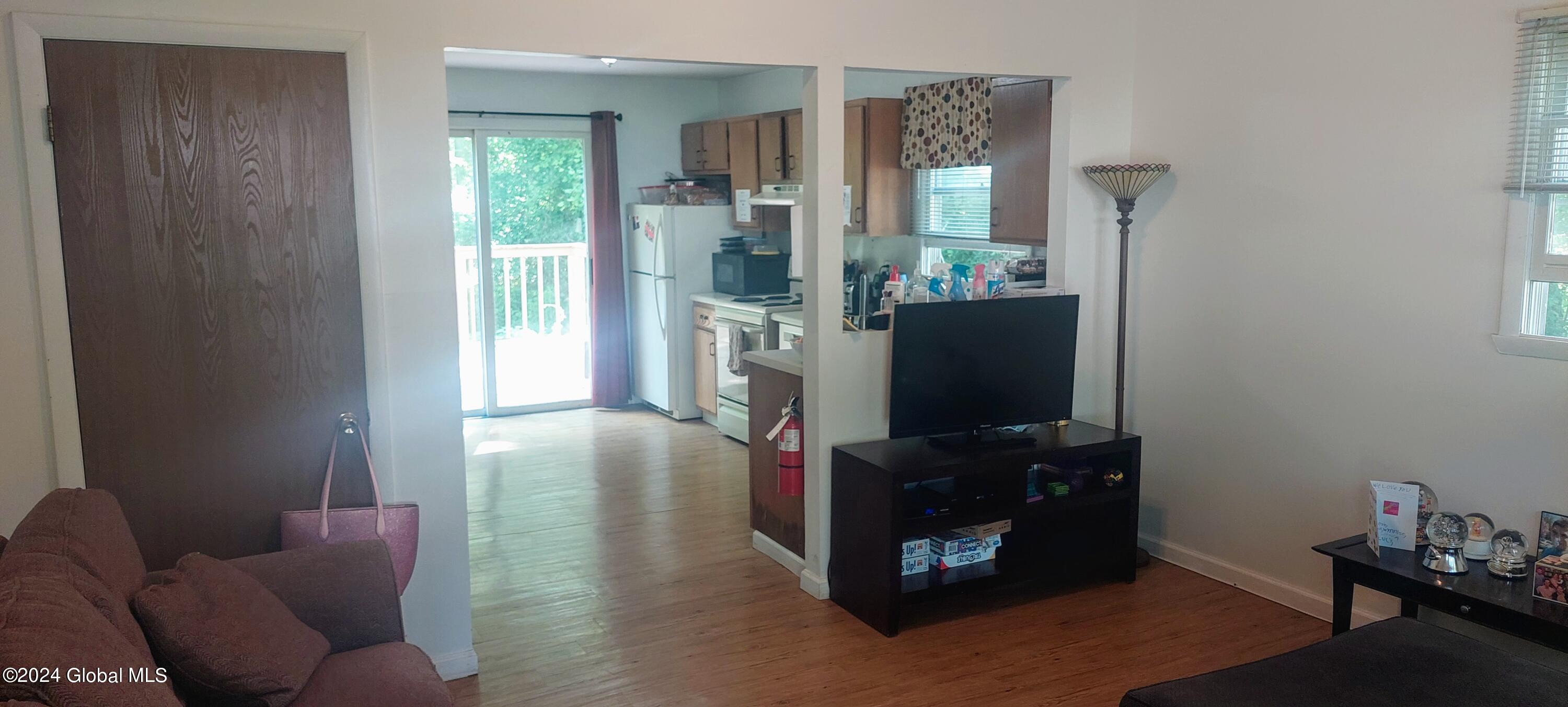 5942 Curry Rd Extension Guilderland, NY 12303 - Photo 13 of 18 Unit 2 living room roger