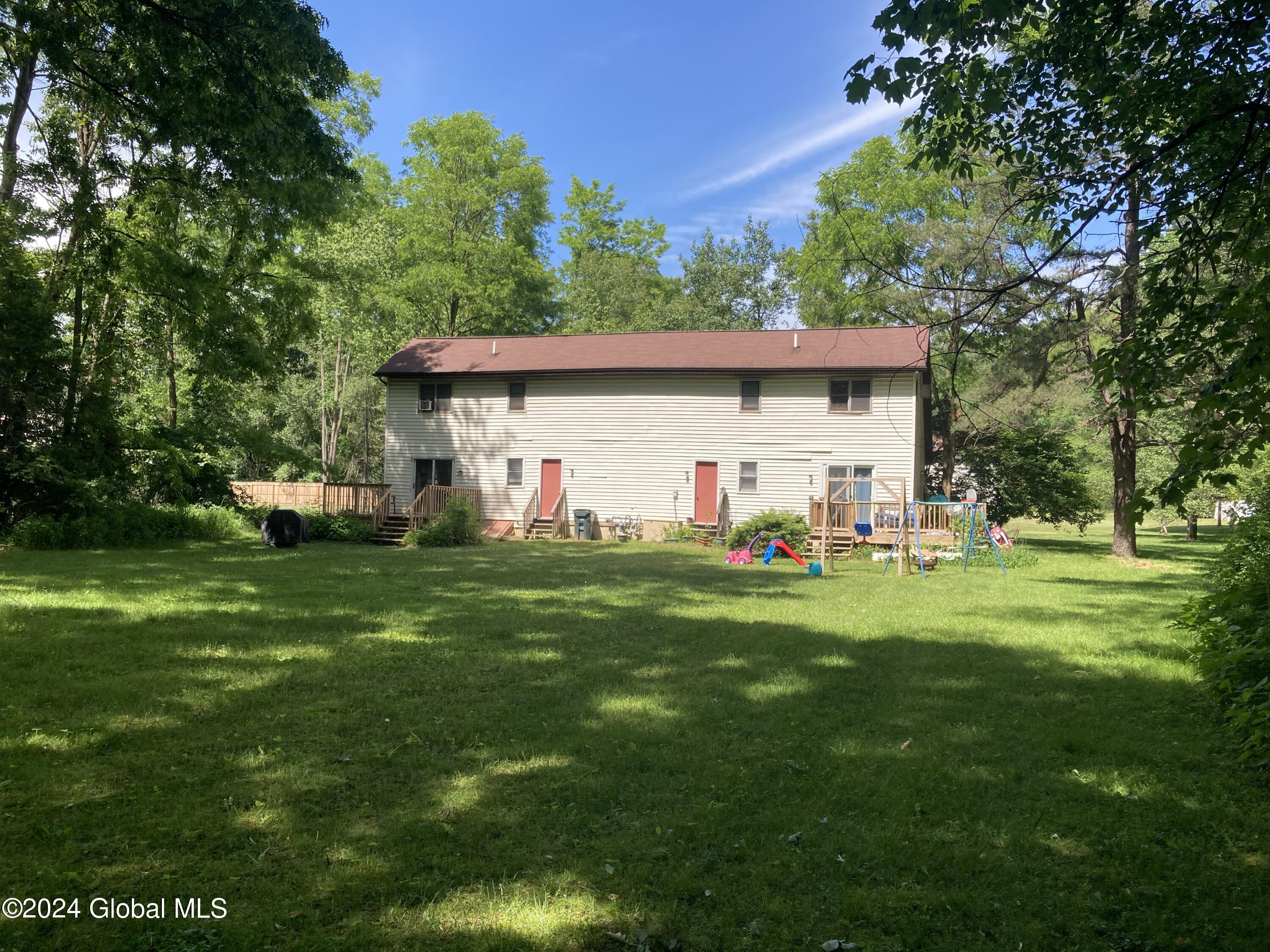 5942 Curry Rd Extension Guilderland, NY 12303 - Photo 3 of 18 Back of home