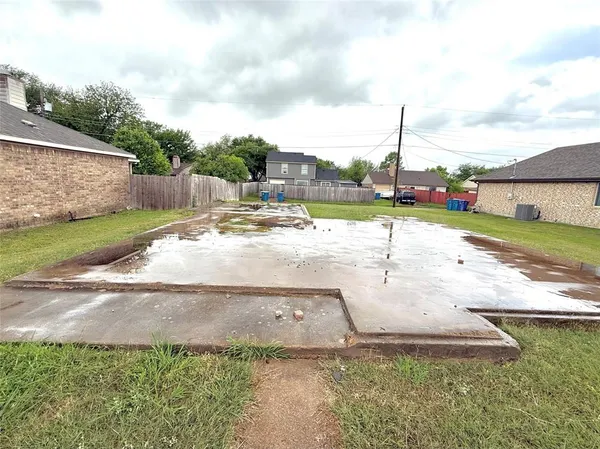 a view of a terrace with yard