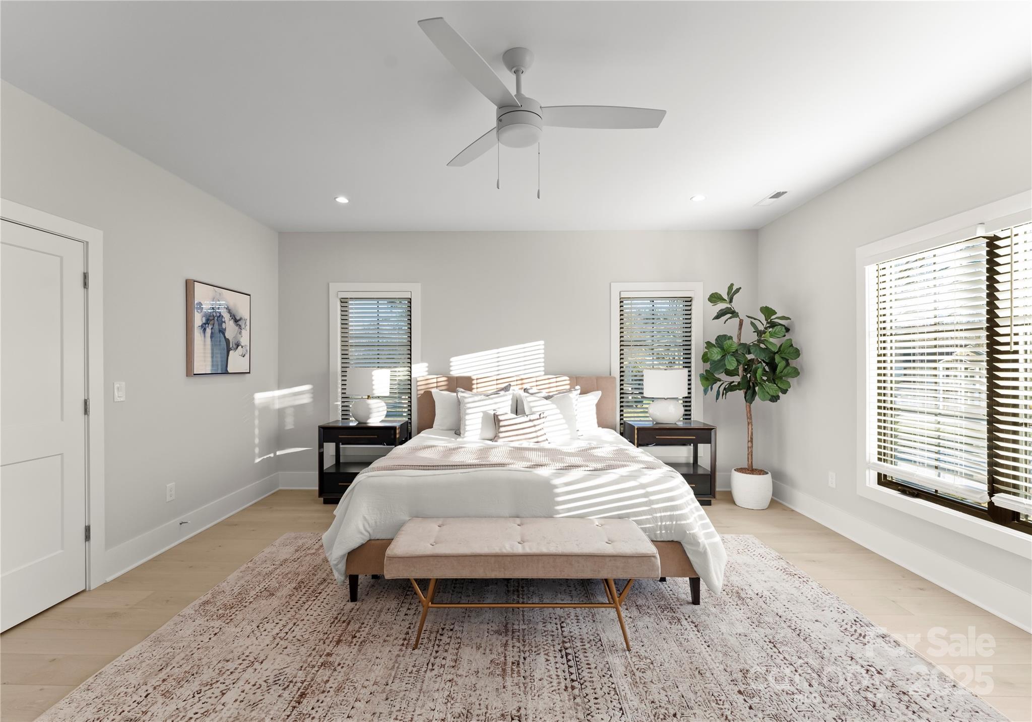 19405 Coachmans Trace Cornelius, NC 28031 - Photo 28 of 44 a bedroom with a large bed and a window