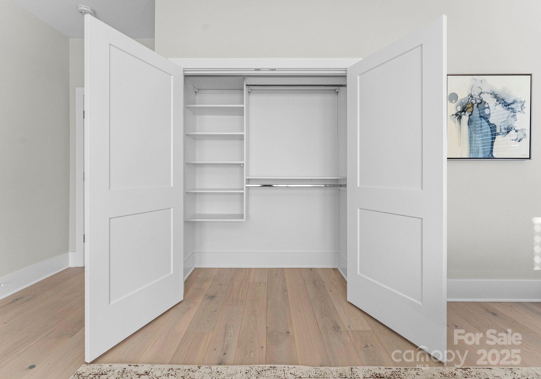 19405 Coachmans Trace Cornelius, NC 28031 - Photo 29 of 44 a view of a room with wooden floor