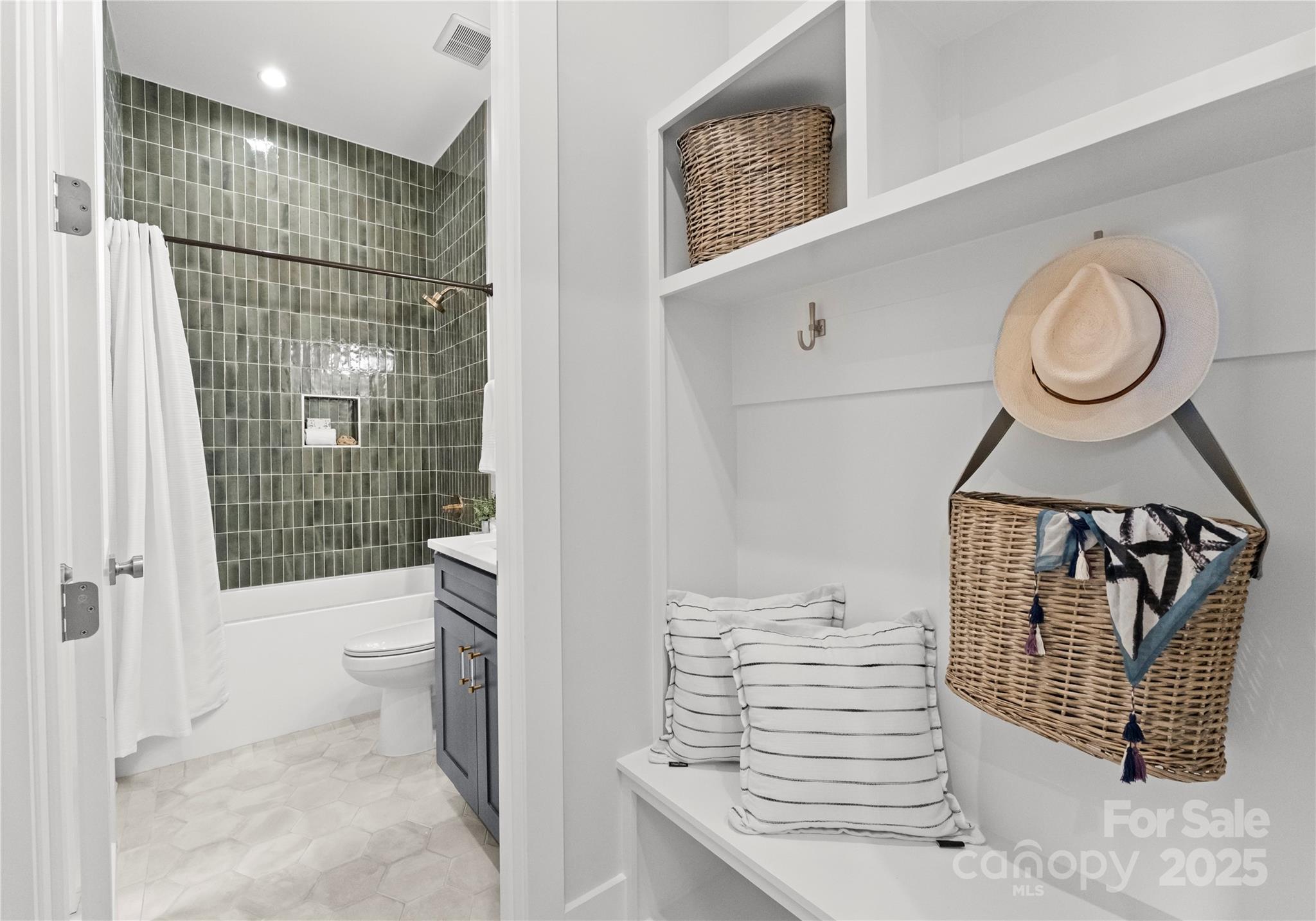 19405 Coachmans Trace Cornelius, NC 28031 - Photo 10 of 44 a bathroom with a toilet and a shower