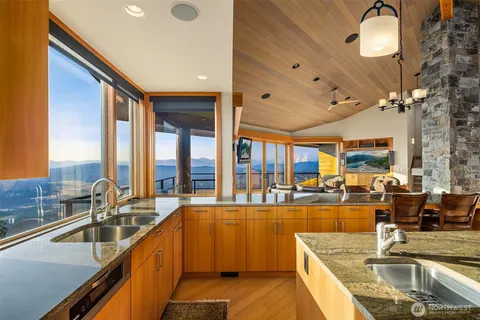 a very nice looking kitchen with a large window