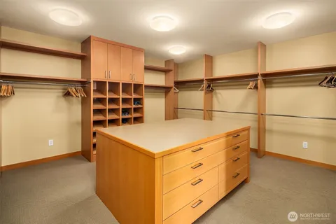 a kitchen with a cabinets and a stove top oven