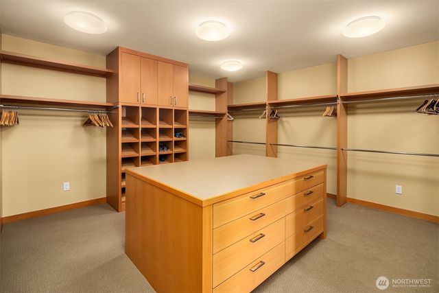 a kitchen with a cabinets and a stove top oven
