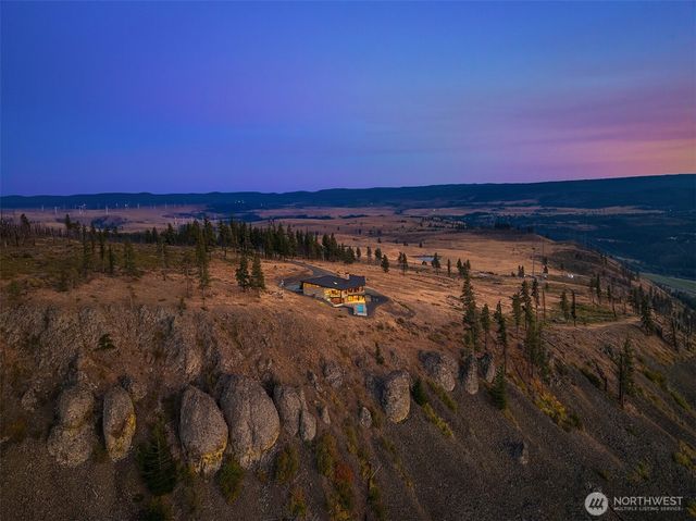 a view of a lake in middle of forest