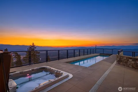 a view of a backyard with a tub