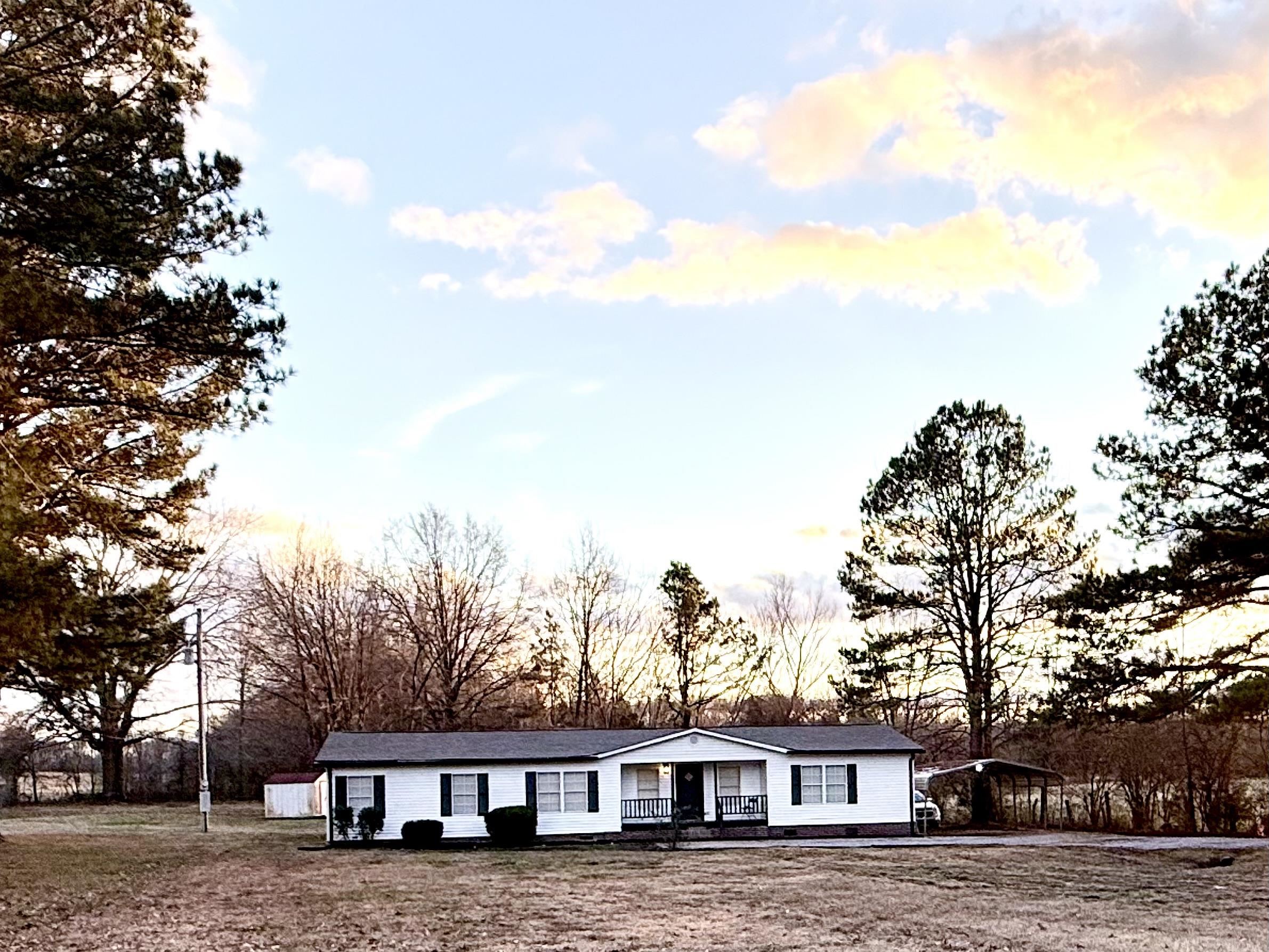 800 Highway 59 Mason, TN 38049 - Photo 2 of 11 a view of a house with a yard and tree s