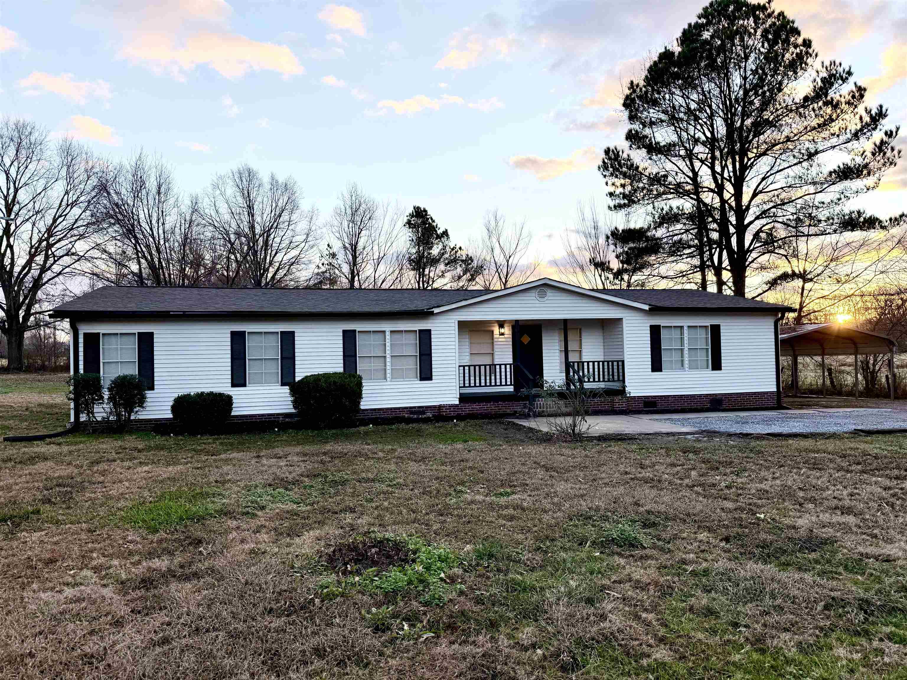 800 Highway 59 Mason, TN 38049 - Photo 4 of 11 a front view of a house with garden