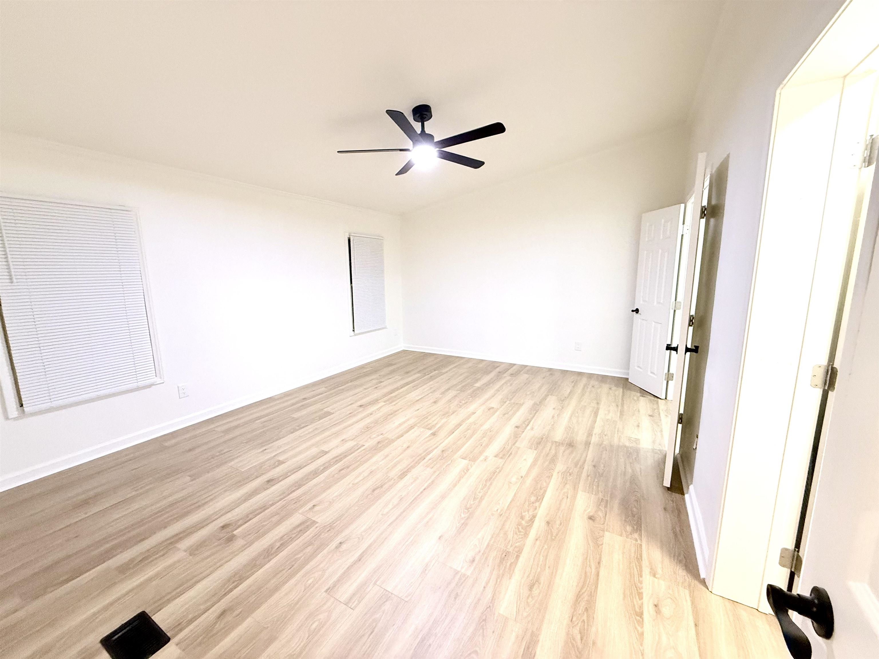 800 Highway 59 Mason, TN 38049 - Photo 7 of 11 a view of a room with wooden floor and white walls