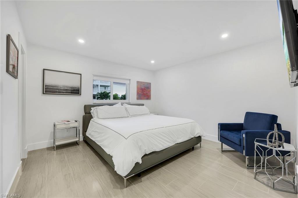 10002 Vanderbilt Drive Naples, FL 34108 - Photo 18 of 42 Spacious bedroom