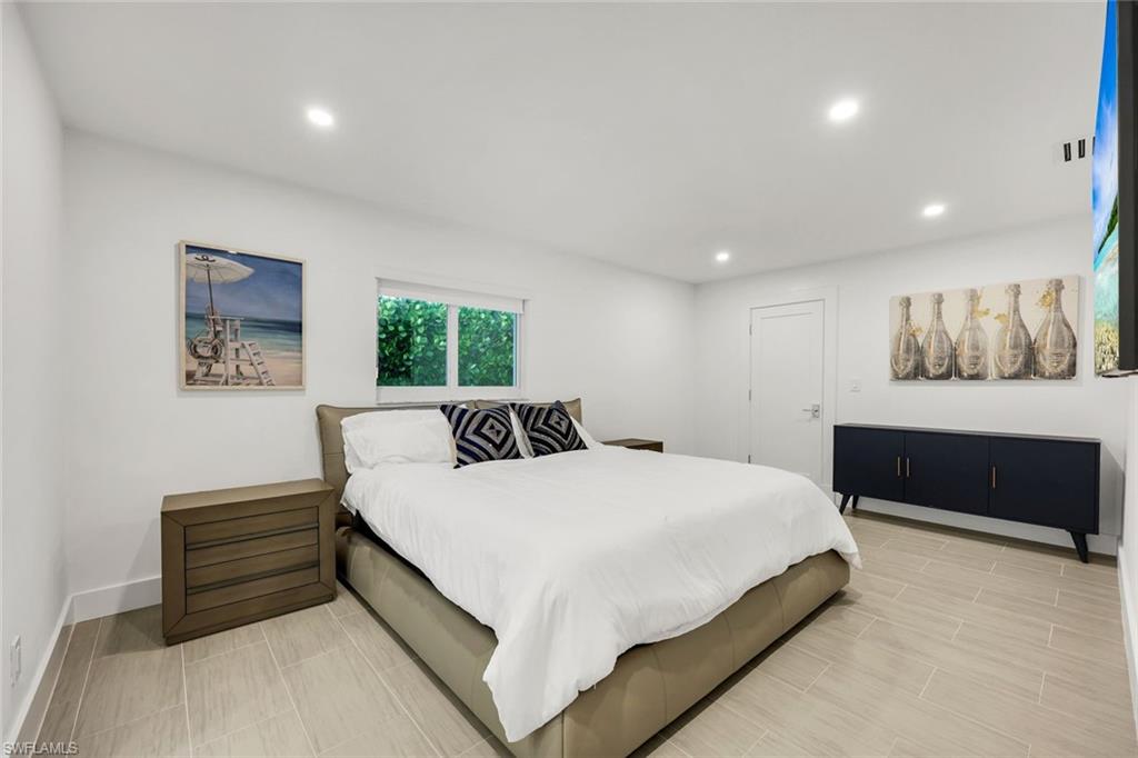 10002 Vanderbilt Drive Naples, FL 34108 - Photo 22 of 42 Each spacious bedroom is ensuite