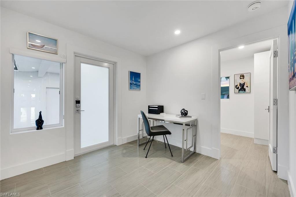10002 Vanderbilt Drive Naples, FL 34108 - Photo 24 of 42 Bonus Room off the courtyard