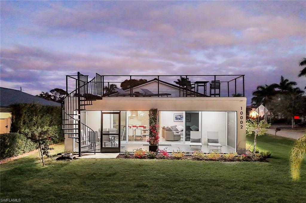 10002 Vanderbilt Drive Naples, FL 34108 - Photo 27 of 42 Enjoy entertaining your guests on both levels.