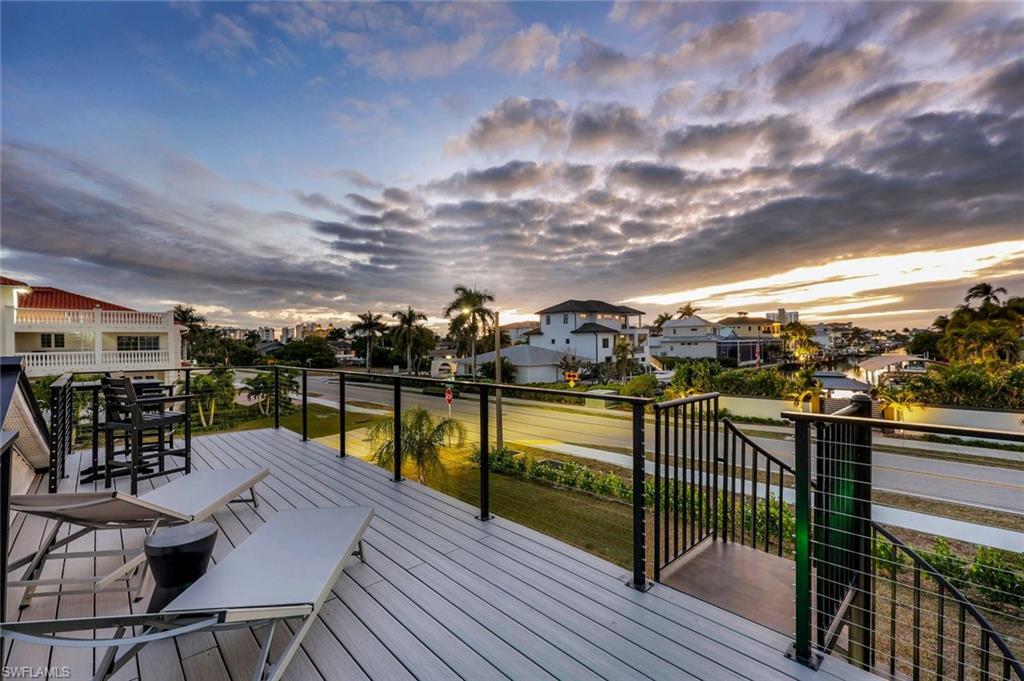 10002 Vanderbilt Drive Naples, FL 34108 - Photo 3 of 42 Evening glow on the water