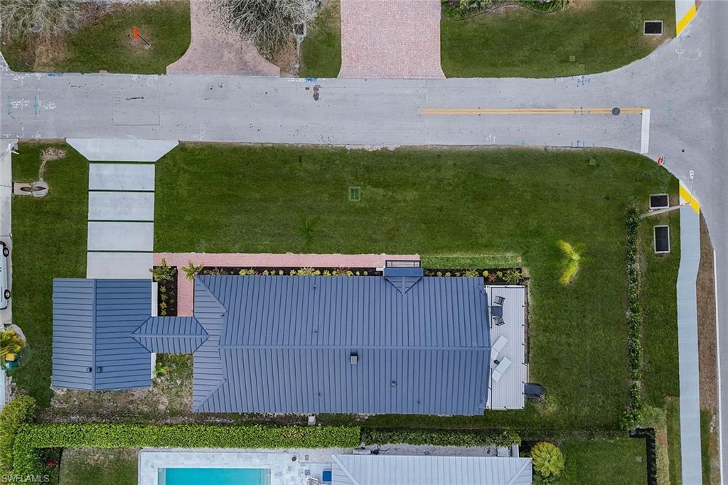 10002 Vanderbilt Drive Naples, FL 34108 - Photo 32 of 42 Aerial view of home and oversized corner lot