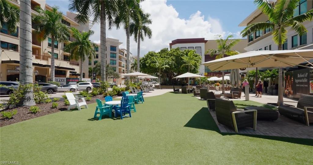 10002 Vanderbilt Drive Naples, FL 34108 - Photo 37 of 42 Enjoy the afternoon strolling Mercato and listening to live music.