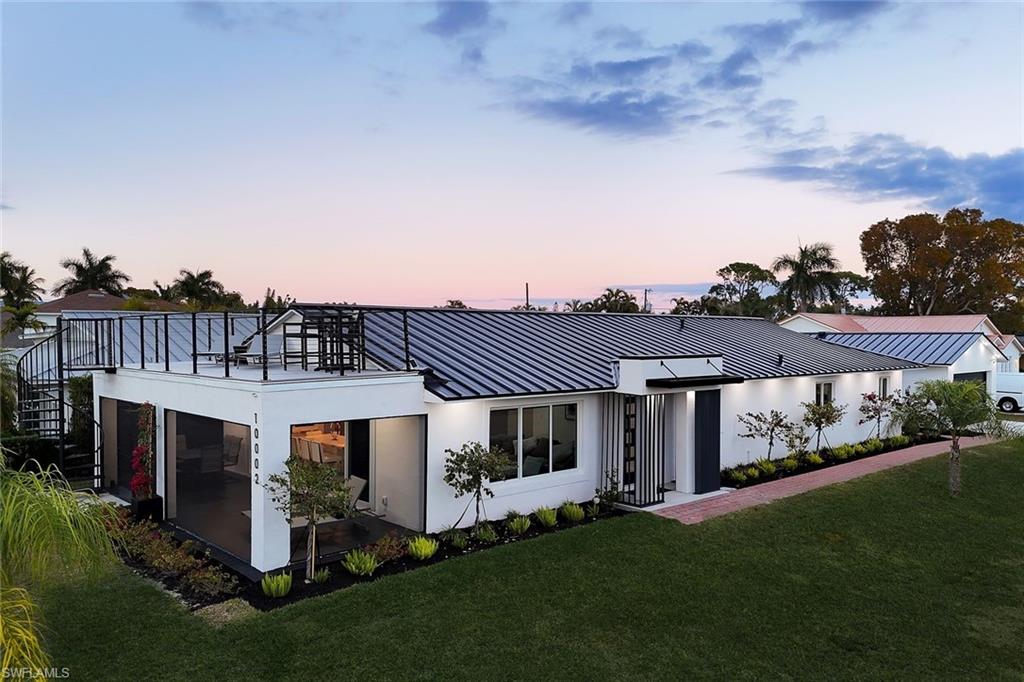 10002 Vanderbilt Drive Naples, FL 34108 - Photo 6 of 42 Modern sleek design