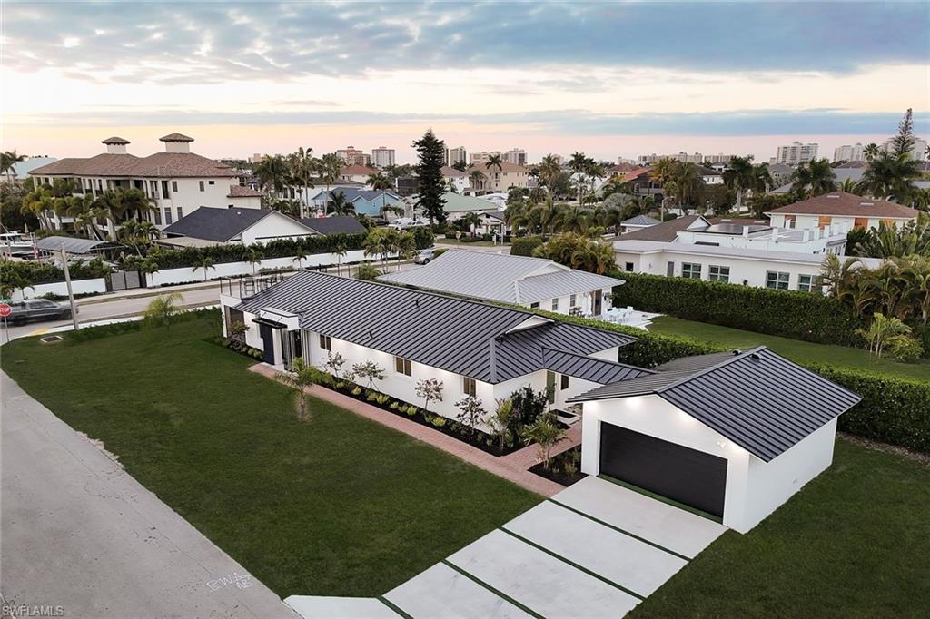 10002 Vanderbilt Drive Naples, FL 34108 - Photo 7 of 42 Completely renovated home on a large corner lot.