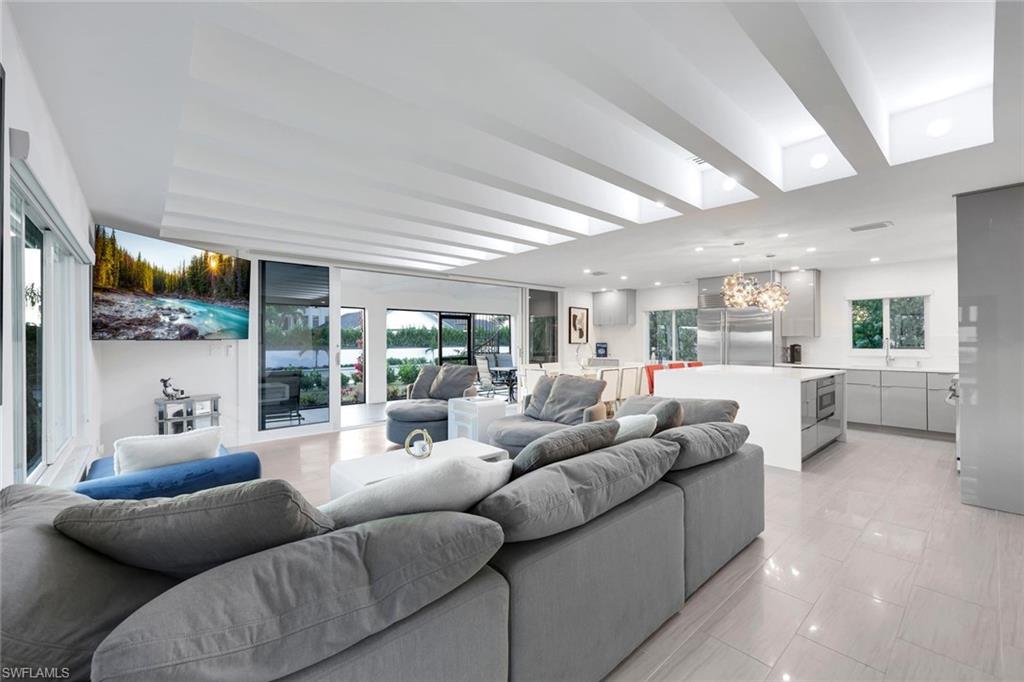 10002 Vanderbilt Drive Naples, FL 34108 - Photo 10 of 42 9 ft ceilings with dramatic linear lighted treatment.