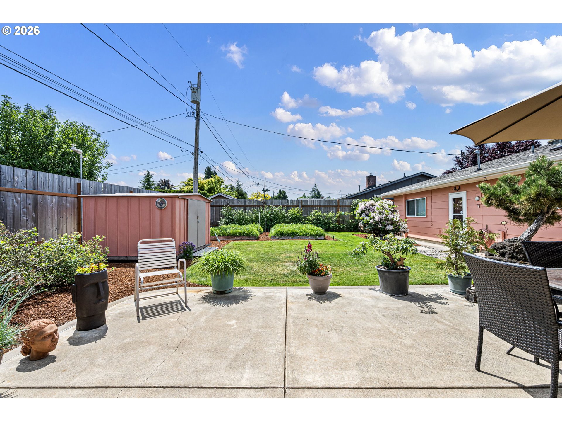 2465 17th Street Springfield, OR 97477 - Photo 38 of 47 a view of a backyard with furniture and a garden