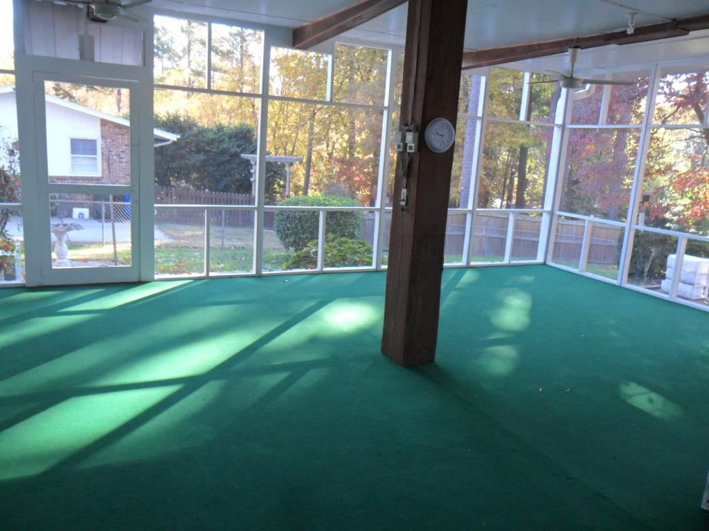 524 Harvard Street Raleigh, NC 27609 - Photo 19 of 25 Huge Screened in porch. If you walk up 2 stairs their is a indoor workshop to the left, huge pantry and huge laundry room. In the laundry area is the hot water heater which is a Energy Smart Heavy Duty that is adjustable. Brand is "Whirlpool.
