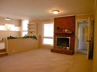 524 Harvard Street Raleigh, NC 27609 - Photo 8 of 25 Very cozy Den with masonry fireplace. The Den looks into the kitchen/ separate eating area off from the kitchen.