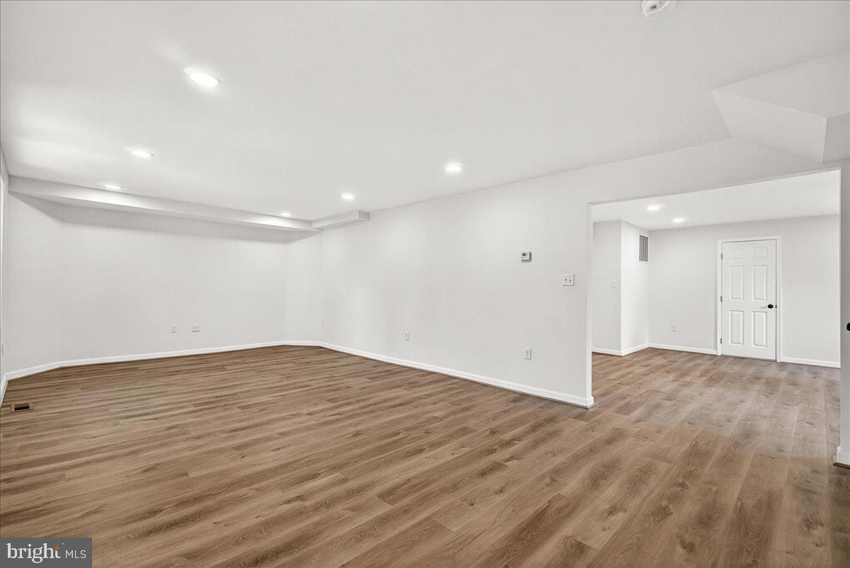 629 Wilson Place Frederick, MD 21702 - Photo 13 of 39 a view of empty room with wooden floor